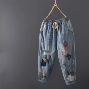 Damskie Jeansy Vintage – Luźny Krój, Sprany Denim, Stylowe Przetarcia