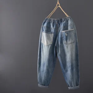 Damskie Jeansy Vintage – Luźny Krój, Sprany Denim, Stylowe Przetarcia