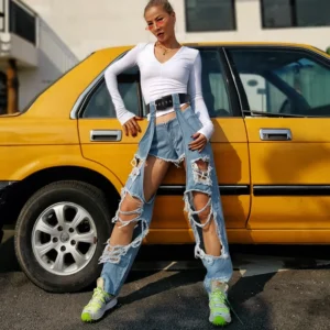 Jeansy Damskie streetwear z wysokim stanem – szerokie nogawki, efektowne dziury