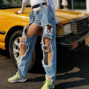 Jeansy Damskie streetwear z wysokim stanem – szerokie nogawki, efektowne dziury
