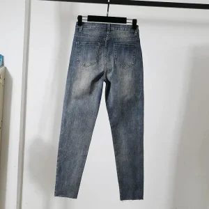 Jeansy damskie – luźny krój, wysoki stan, modny streetwear