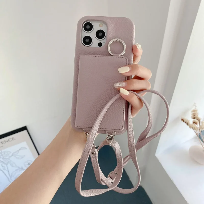 Etui na telefon z portfelem na karty, z paskiem, z lusterkiem, z uchwytem