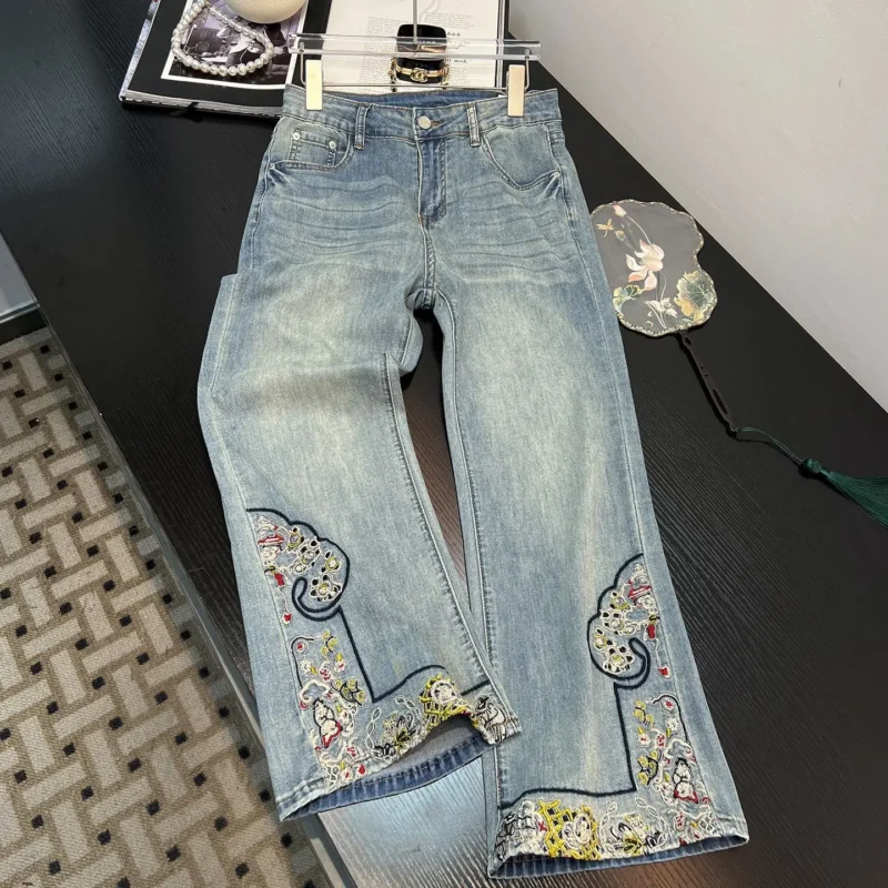 Jeansy damskie wide leg z wysokim stanem, z haftem