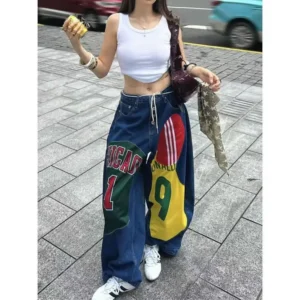 Jeansy damskie baggy z kolorowym nadrukiem postaci - ujęcie produktu