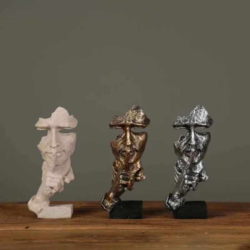 Abstrakcyjna figurka twarz i dłoń z żywicy