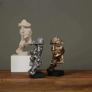 Abstrakcyjna figurka twarz i dłoń z żywicy