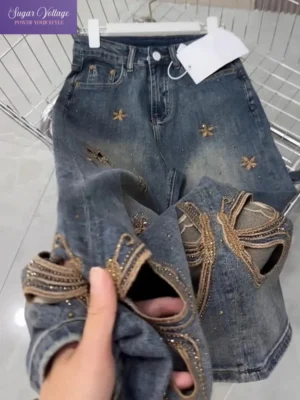 Jeansy damskie baggy z wysokim stanem, z przetarciami, z ozdobnymi dżetami