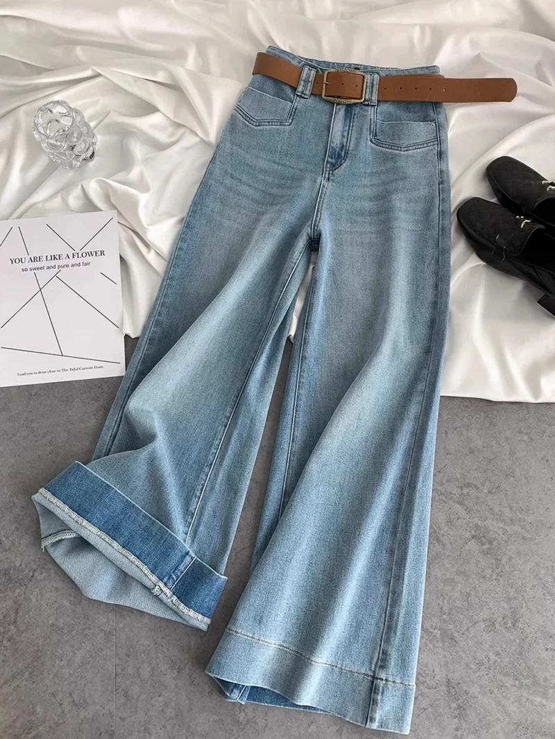 Niebieskie jeansy damskie flare z wysokim stanem, w stylu retro