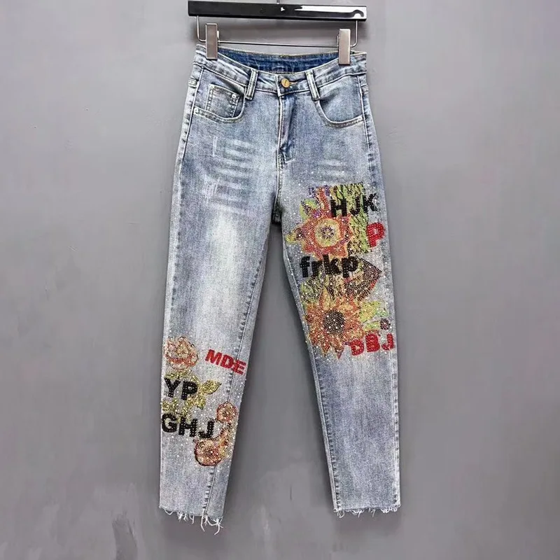 Jeansy damskie slim fit z ozdobnymi dżetami, patchworkowe