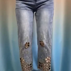 Jeansy damskie slim fit z wysokim stanem, z haftem, z przetarciami