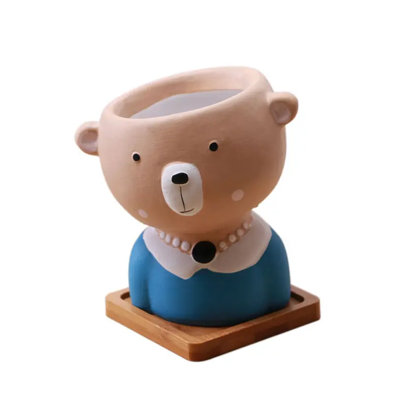 Doniczka ceramiczna z motywem zwierzęcej twarzy - ujęcie produktu