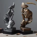 Abstrakcyjna figurka twarz i dłoń z żywicy