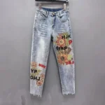 Jeansy damskie slim fit z ozdobnymi dżetami, patchworkowe