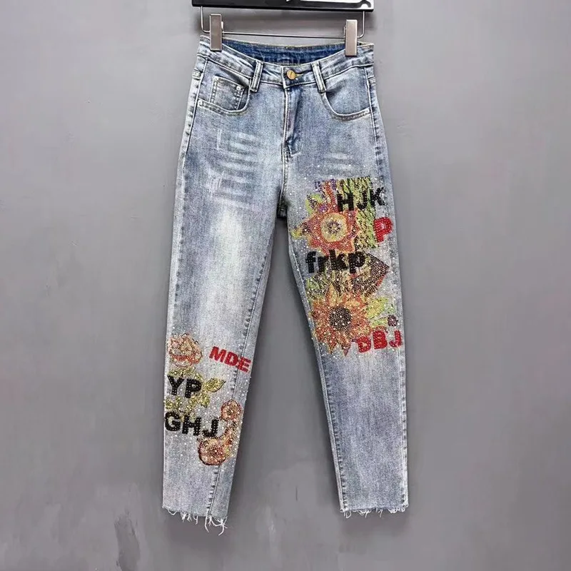 Jeansy damskie slim fit z ozdobnymi dżetami, patchworkowe
