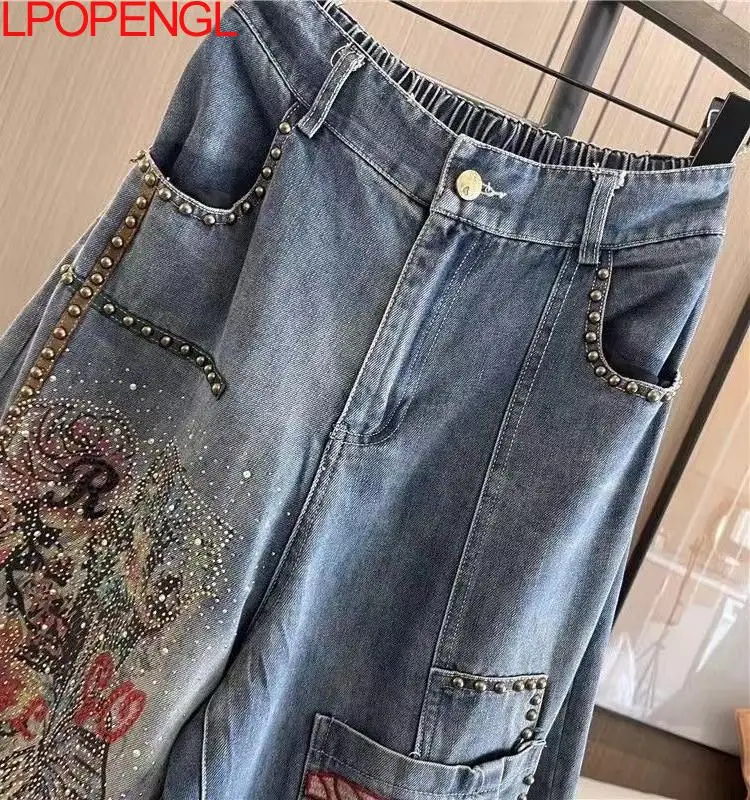 Jeansy damskie baggy z elastycznego denimu, z haftem, z ozdobnymi dżetami