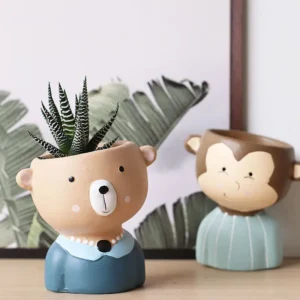 Doniczka ceramiczna z motywem zwierzęcej twarzy - ujęcie produktu