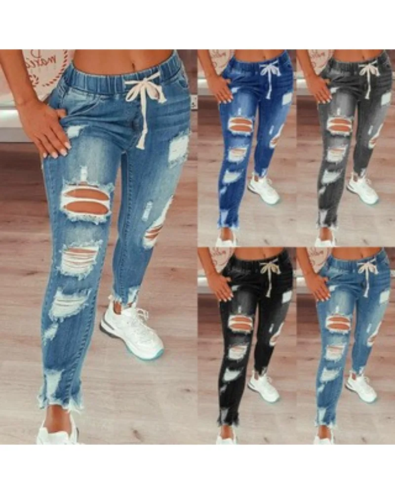 Jeansy damskie slim fit plus size, z elastycznego denimu, z przetarciami