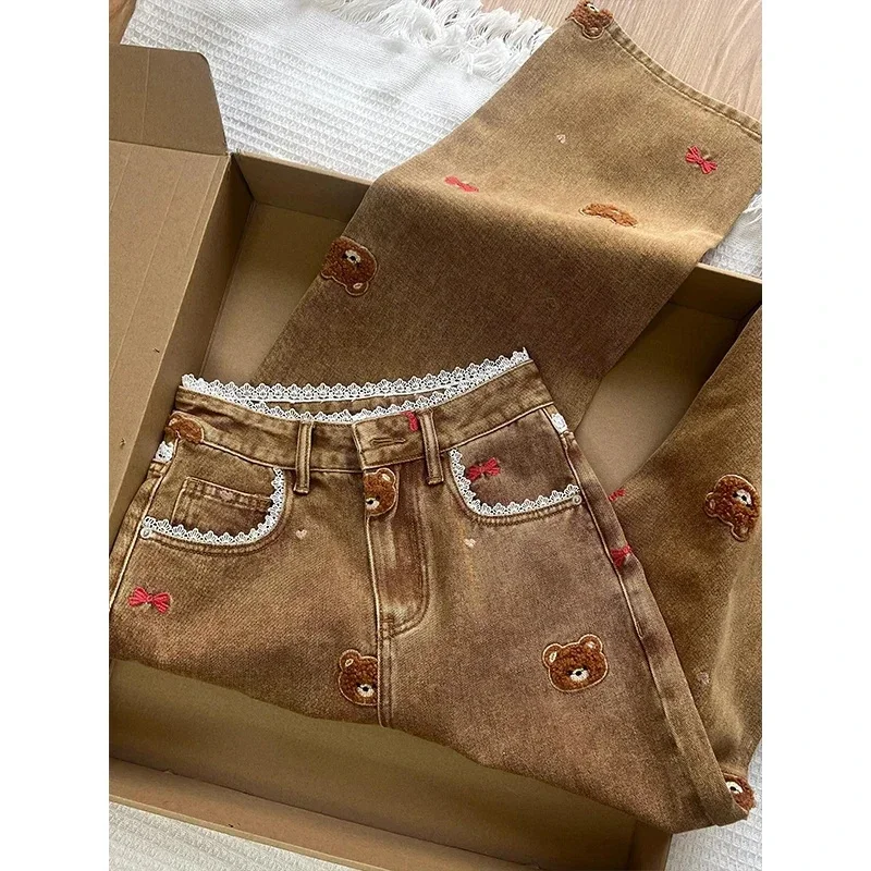 Jeansy damskie wide leg z wysokim stanem, z haftem, z koronką