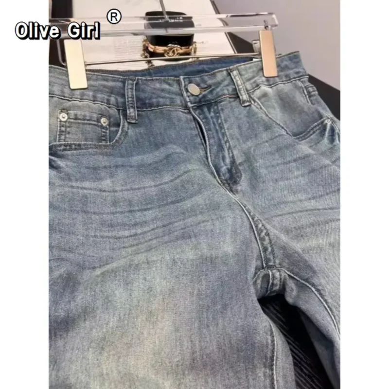 Jeansy damskie wide leg z wysokim stanem, z haftem