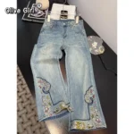 Jeansy damskie wide leg z wysokim stanem, z haftem