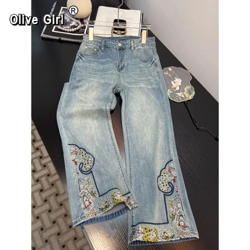 Jeansy damskie wide leg z wysokim stanem, z haftem