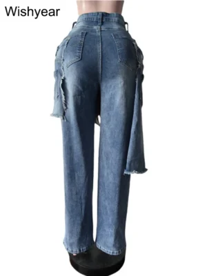 Niebieskie jeansy damskie wide leg z elastycznego denimu, z przetarciami