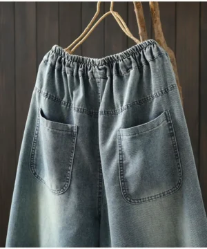 Jeansy damskie baggy z elastycznego denimu, z haftem, z kwiatowym wzorem