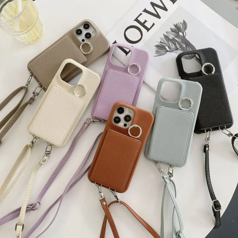 Etui na telefon z portfelem na karty, z paskiem, z lusterkiem, z uchwytem