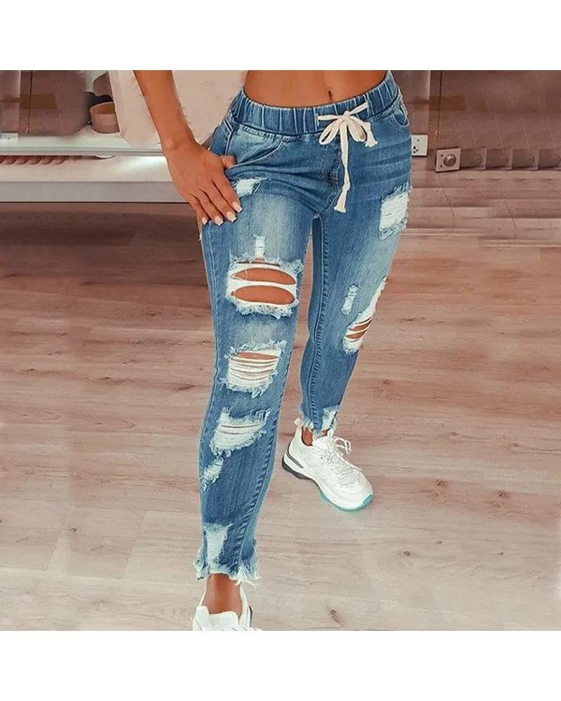 Jeansy damskie slim fit plus size, z elastycznego denimu, z przetarciami