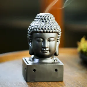 Figurka głowy Buddy na kwadratowej podstawie - ujęcie produktu