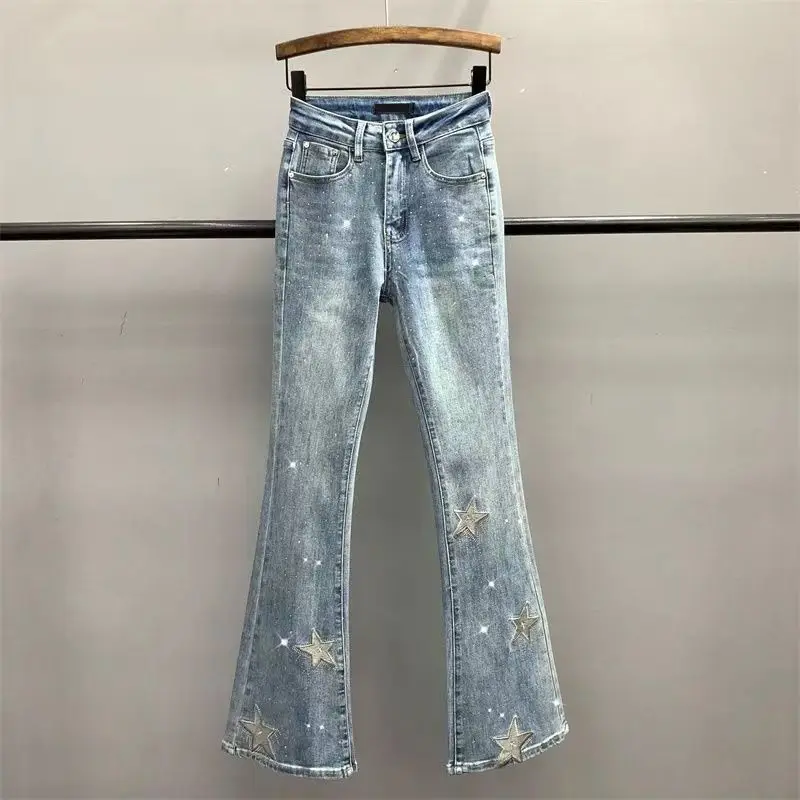 Jeansy damskie slim fit z wysokim stanem, z elastycznego denimu, z haftem