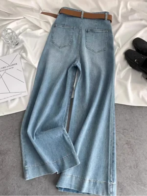 Niebieskie jeansy damskie flare z wysokim stanem, w stylu retro