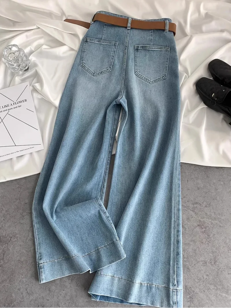 Niebieskie jeansy damskie flare z wysokim stanem, w stylu retro