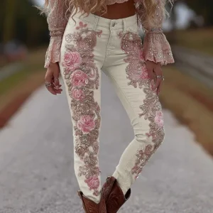 Jeansy damskie z wysokim stanem, z elastycznego denimu, z kwiatowym wzorem