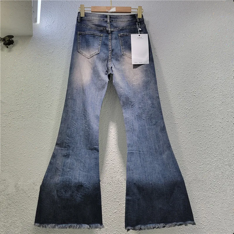 Jeansy damskie flare z haftem, w stylu retro