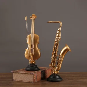 Złota figurka instrument muzyczny z żywicy