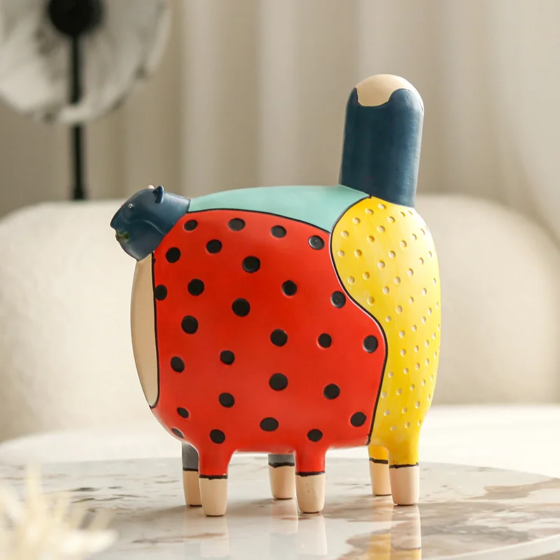 Kolorowa figurka kot w kropki