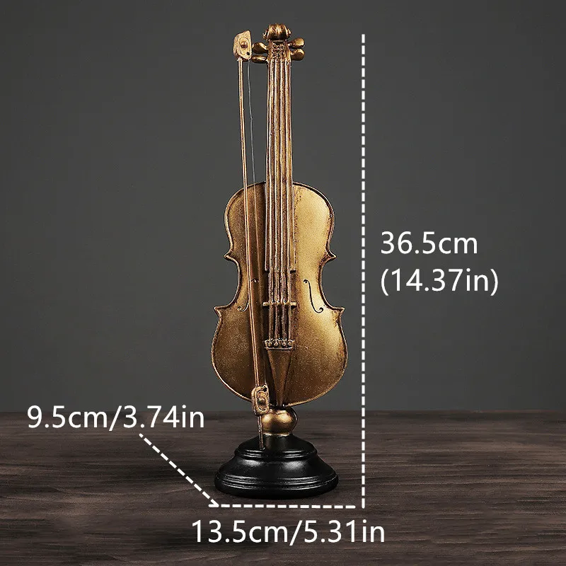 Złota figurka instrument muzyczny z żywicy