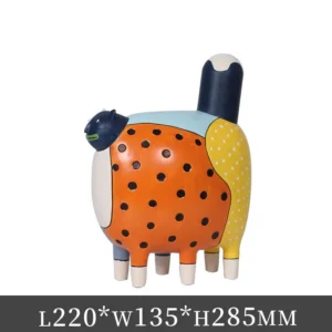 Kolorowa figurka kot w kropki