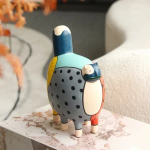 Kolorowa figurka kot w kropki