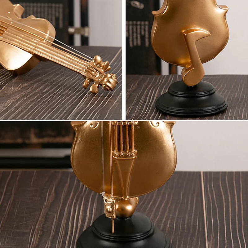 Złota figurka instrument muzyczny z żywicy