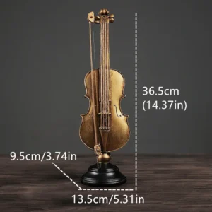 Złota figurka instrument muzyczny z żywicy