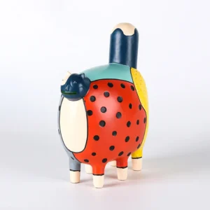 Kolorowa figurka kot w kropki