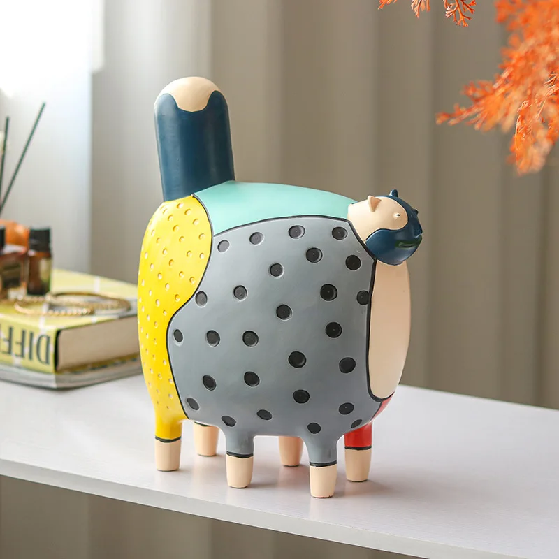 Kolorowa figurka kot w kropki