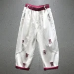 Jeansy damskie baggy z przetarciami