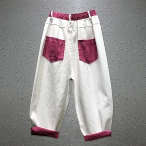 Jeansy damskie baggy z przetarciami