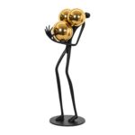 Figurka metalowa ludzik ze złotymi kulami 41 cm, czarna, na biurko - zdjęcie główne