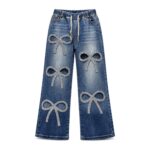 Jeansy damskie szerokie z kokardami z cyrkonii, gumka w pasie, L-4XL - zdjęcie główne